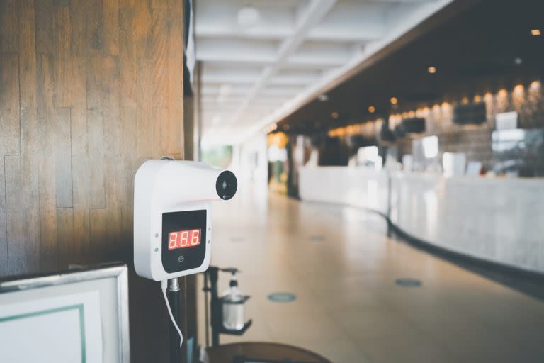 selective focus photo of baby playing activity cube
