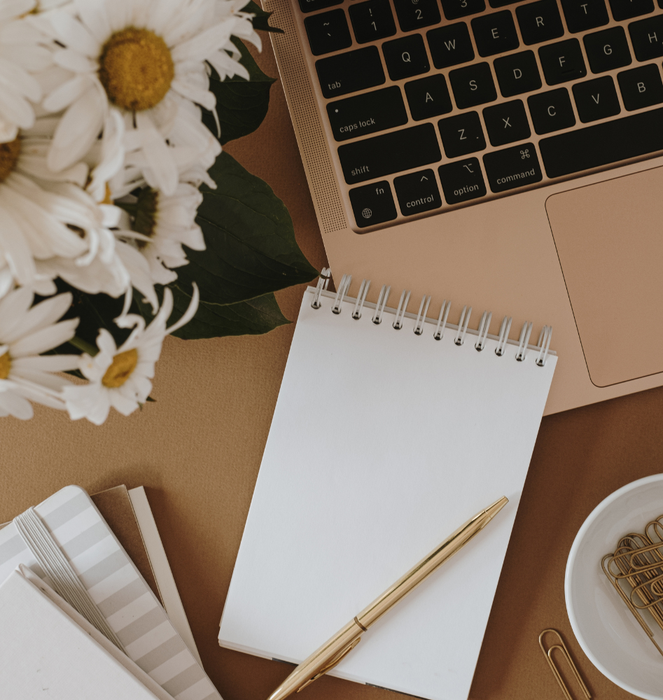 white printer paper on brown wooden table