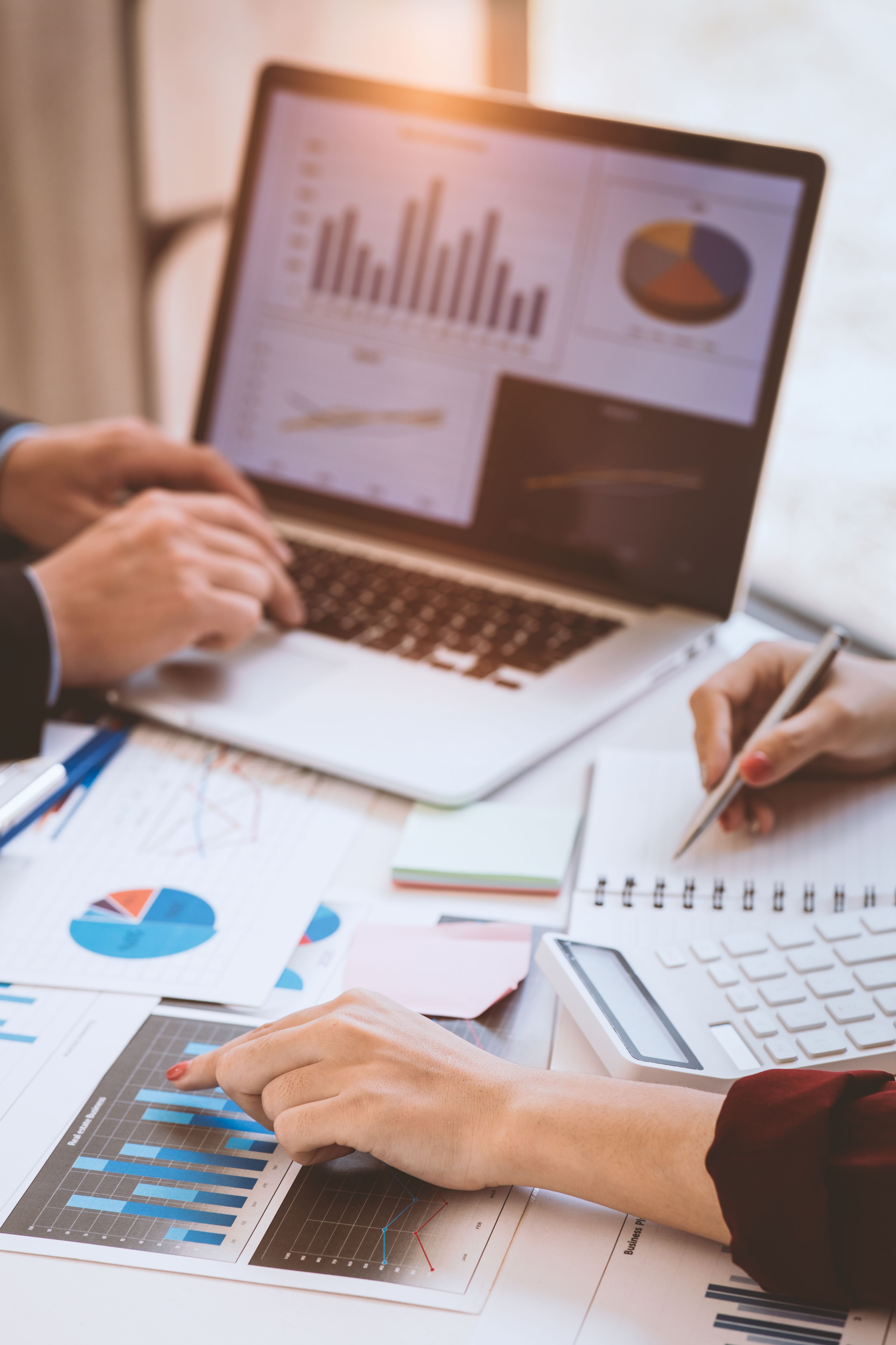 white printer paper on brown wooden table